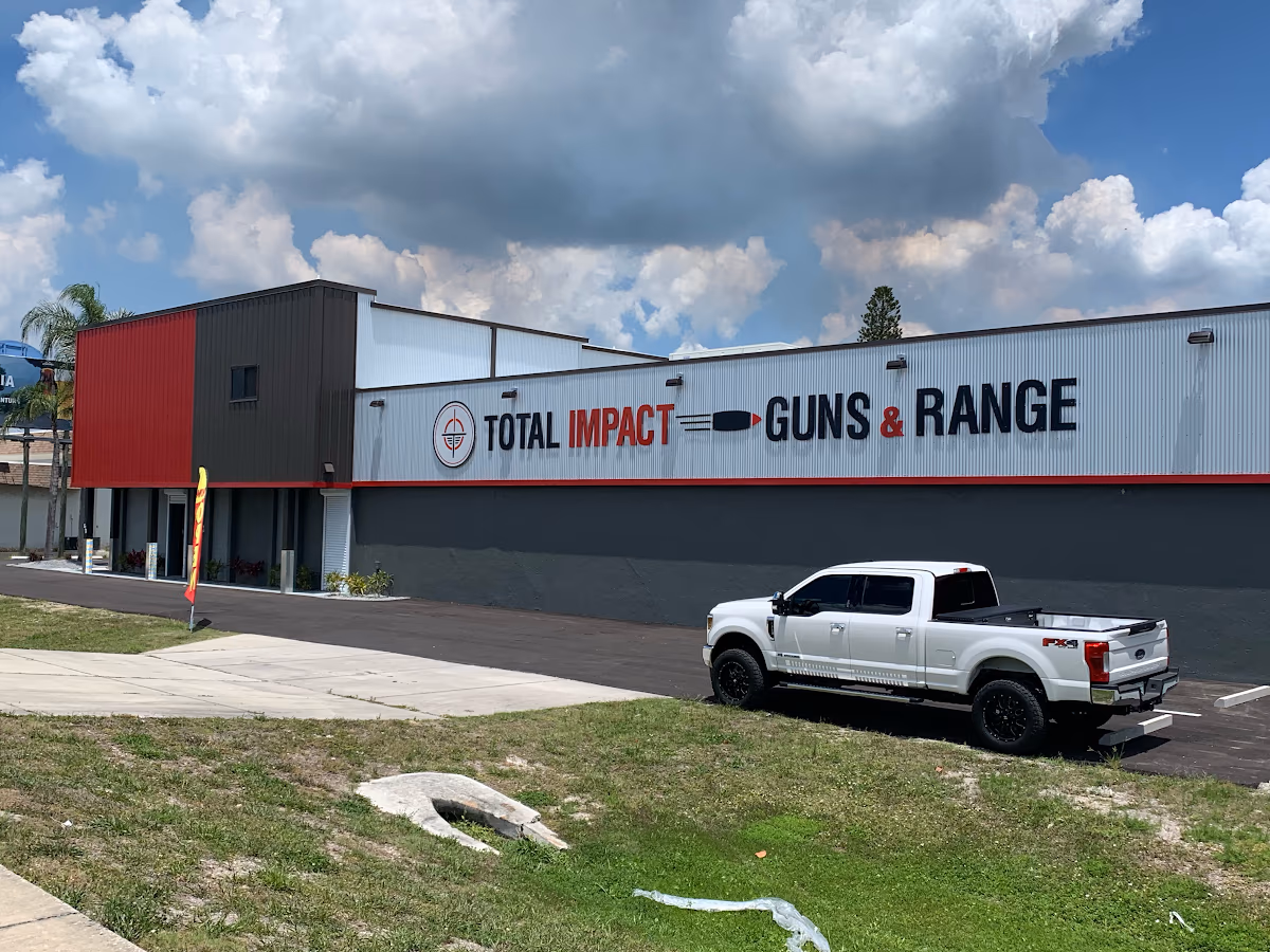 TOTAL IMPACT GUNS AND INDOOR RANGE